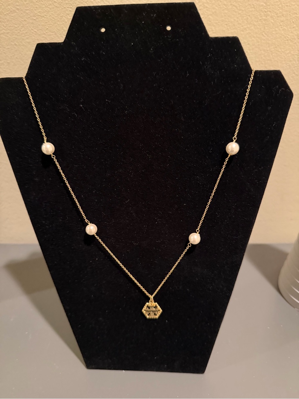 Tory Burch Gold Toned chain necklace with pearls and iconic logo